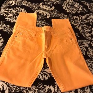 Light orange skinny jeans